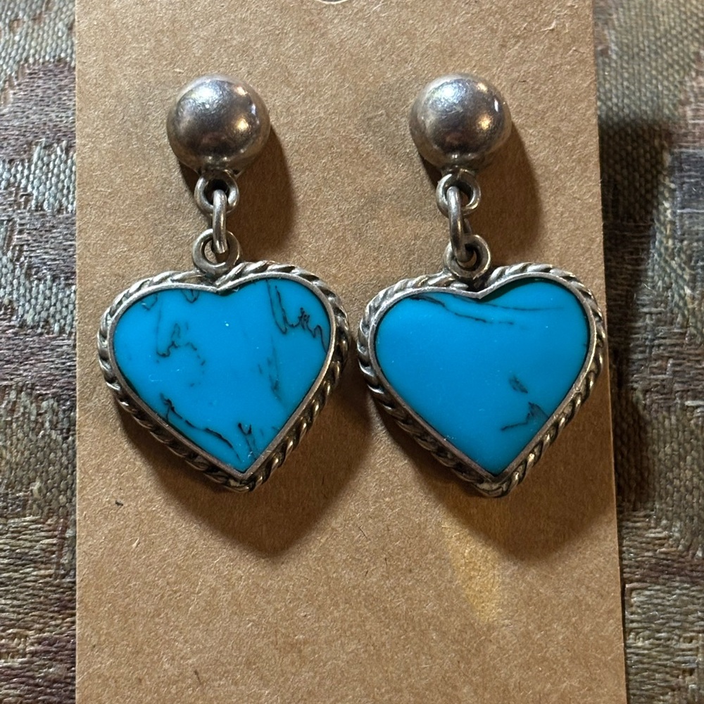 These are new Native American handmade turquoise sterling silver earrings.